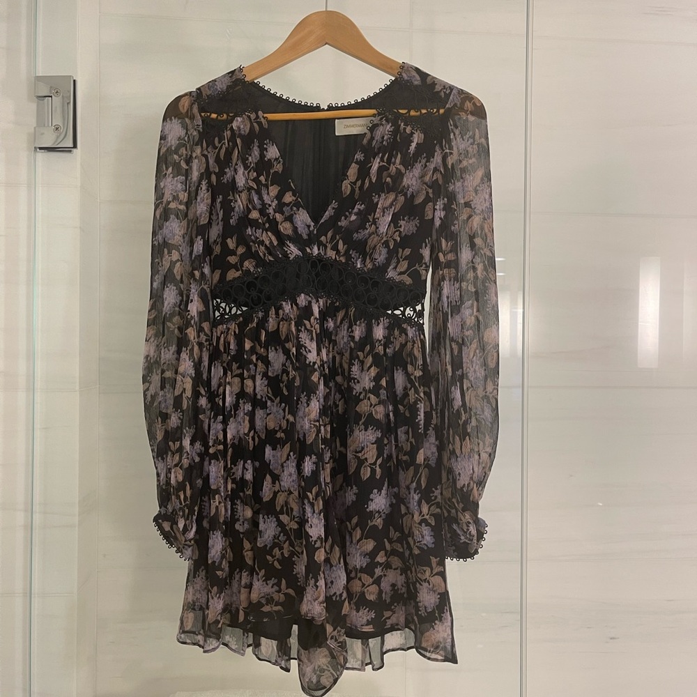 Like new. Zimmermann Jumpsuit. Black with printer violet flowers.